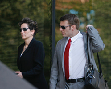 Bobbi and FBI agent walking into court